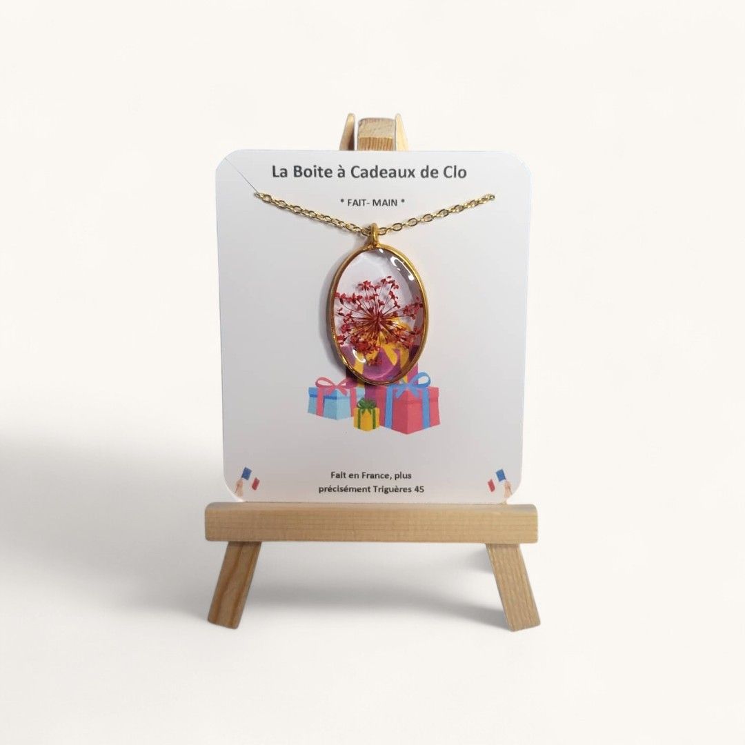 medaillon resine Médaillon en résine ovale fleurs rouge